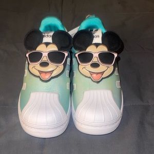 Brand new Mickey Mouse slip on adidas. Never worn. Still have original box